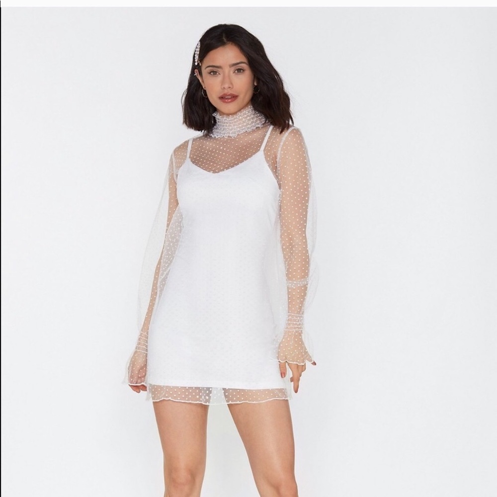 White dress with sheer polka dot overlay